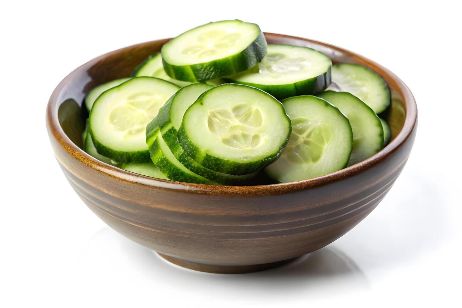 Sliced Cucumbers in a Bowl photo