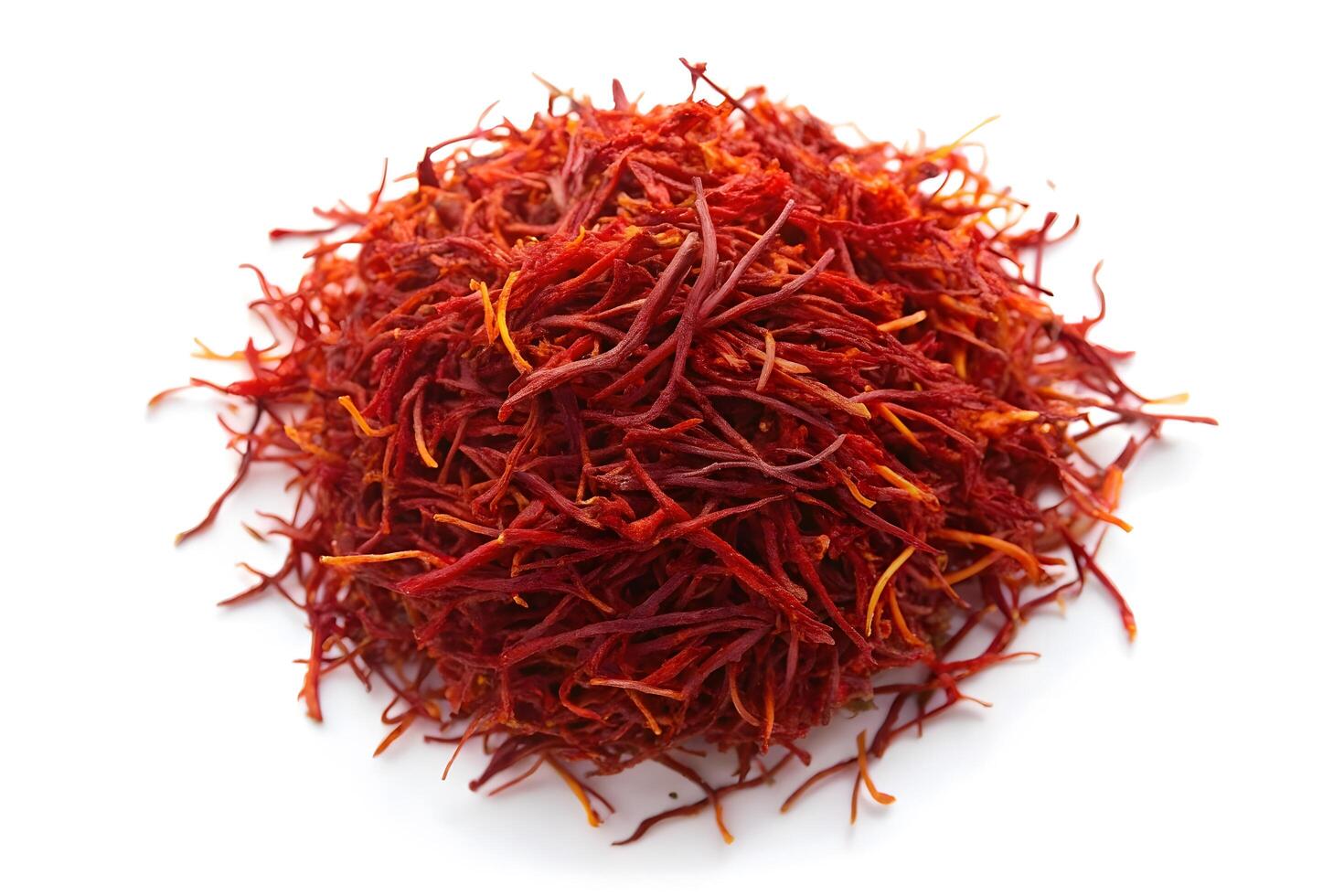Pile of vibrant saffron threads on white background photo