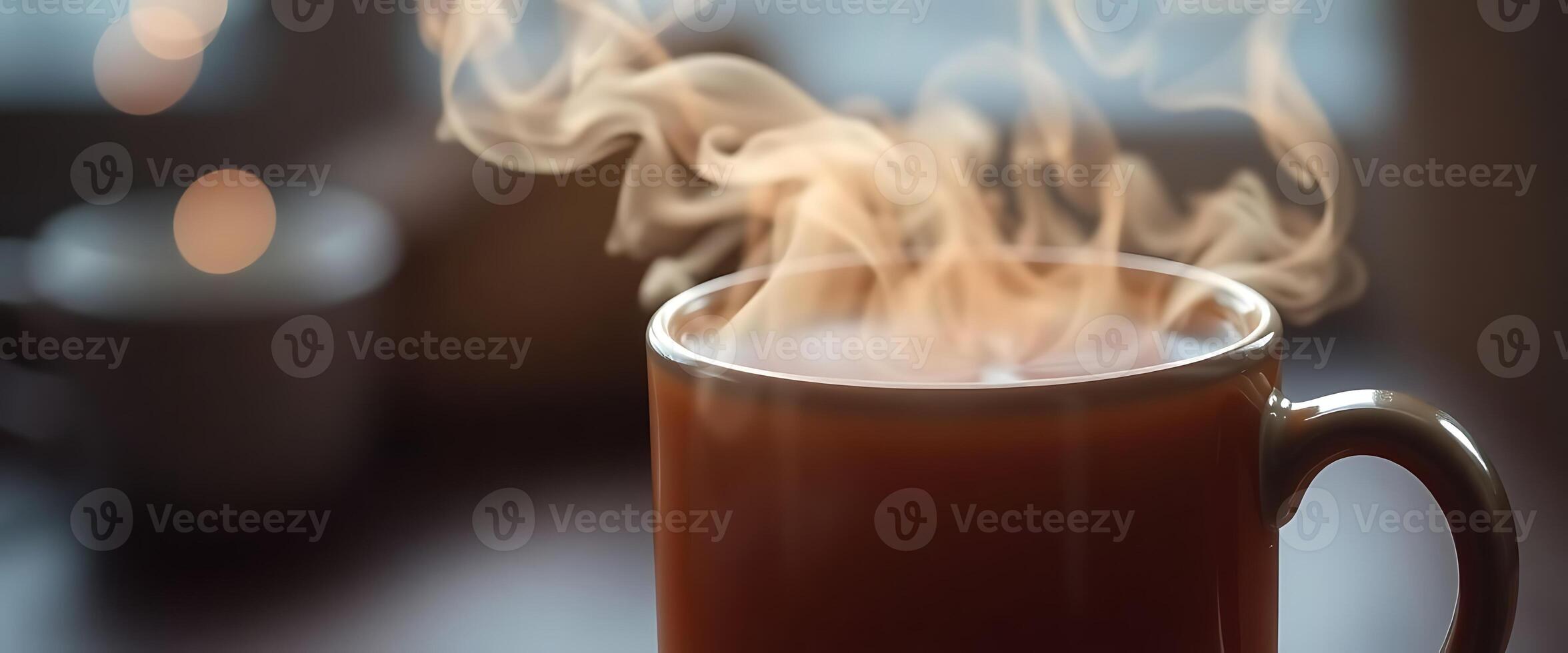 cup of hot chocolate with steam rising from it photo