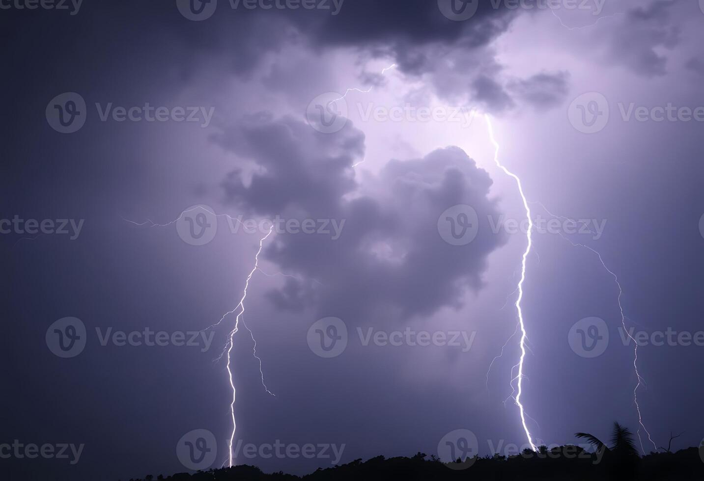 lightning bolt is seen in the sky above a tree photo