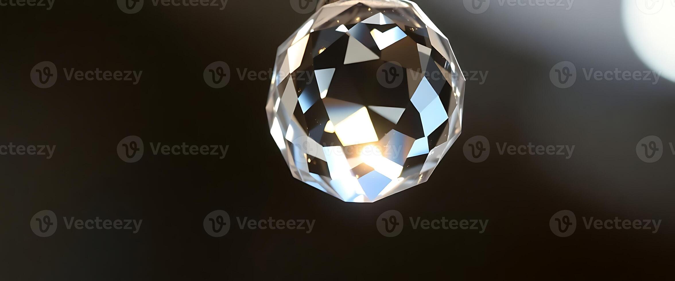 close up of a diamond hanging from a string photo
