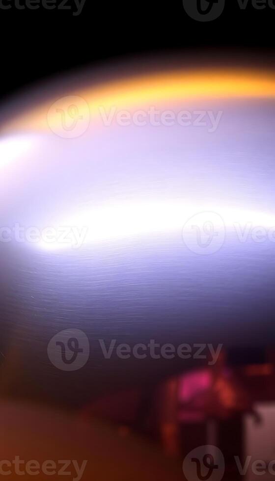 blurry image of a white object with a black background photo