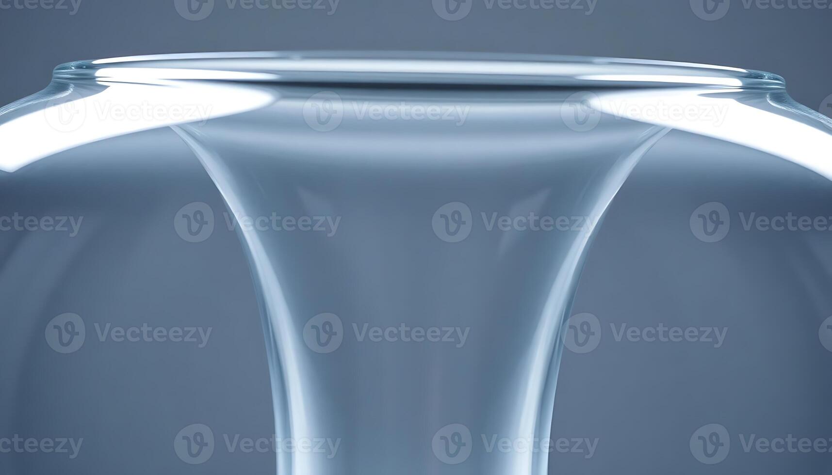 glass vase with a light reflecting off of it photo