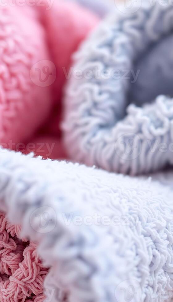 close up of a blanket and a blanket on a bed photo