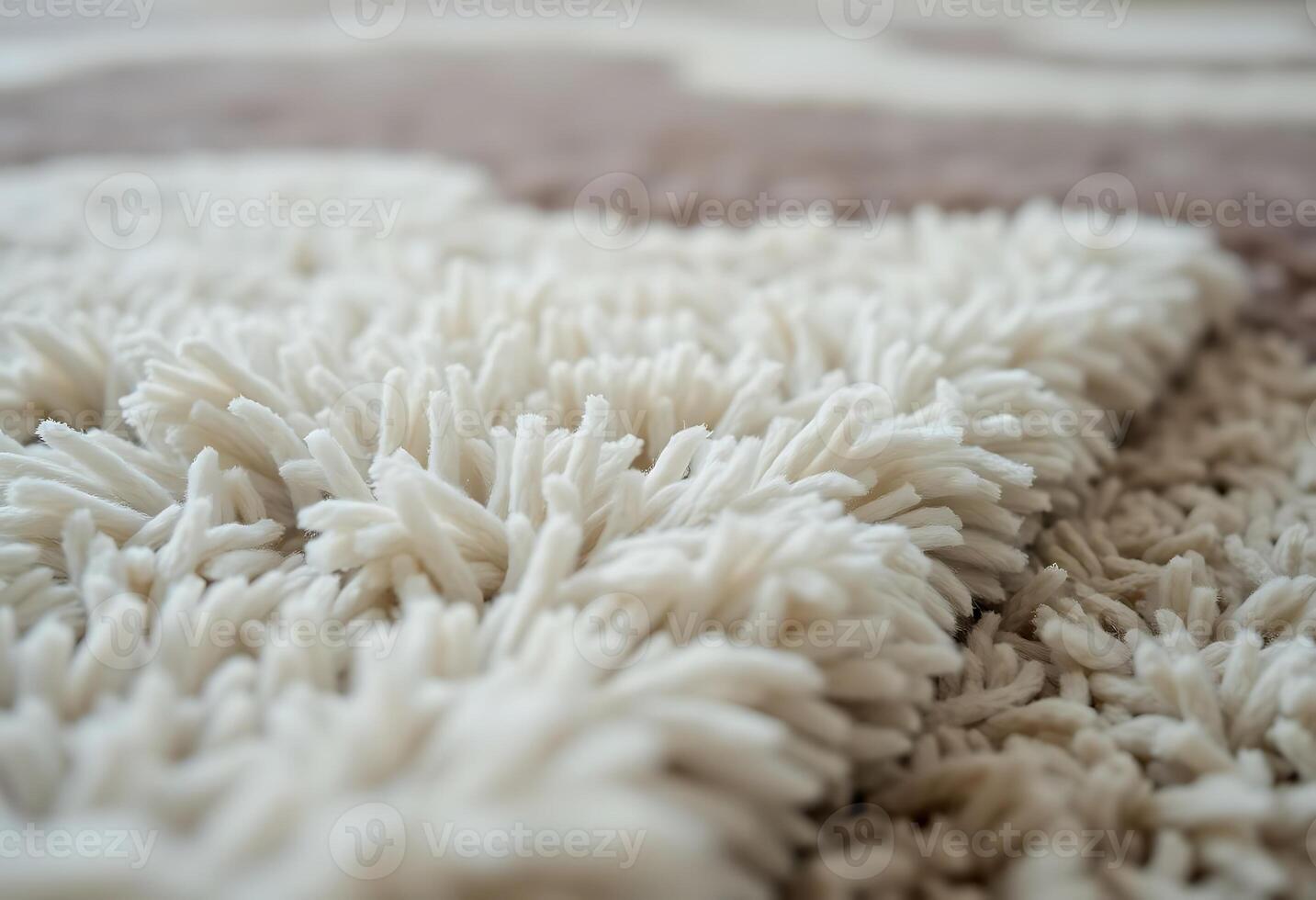 close up of a white rug on the floor photo