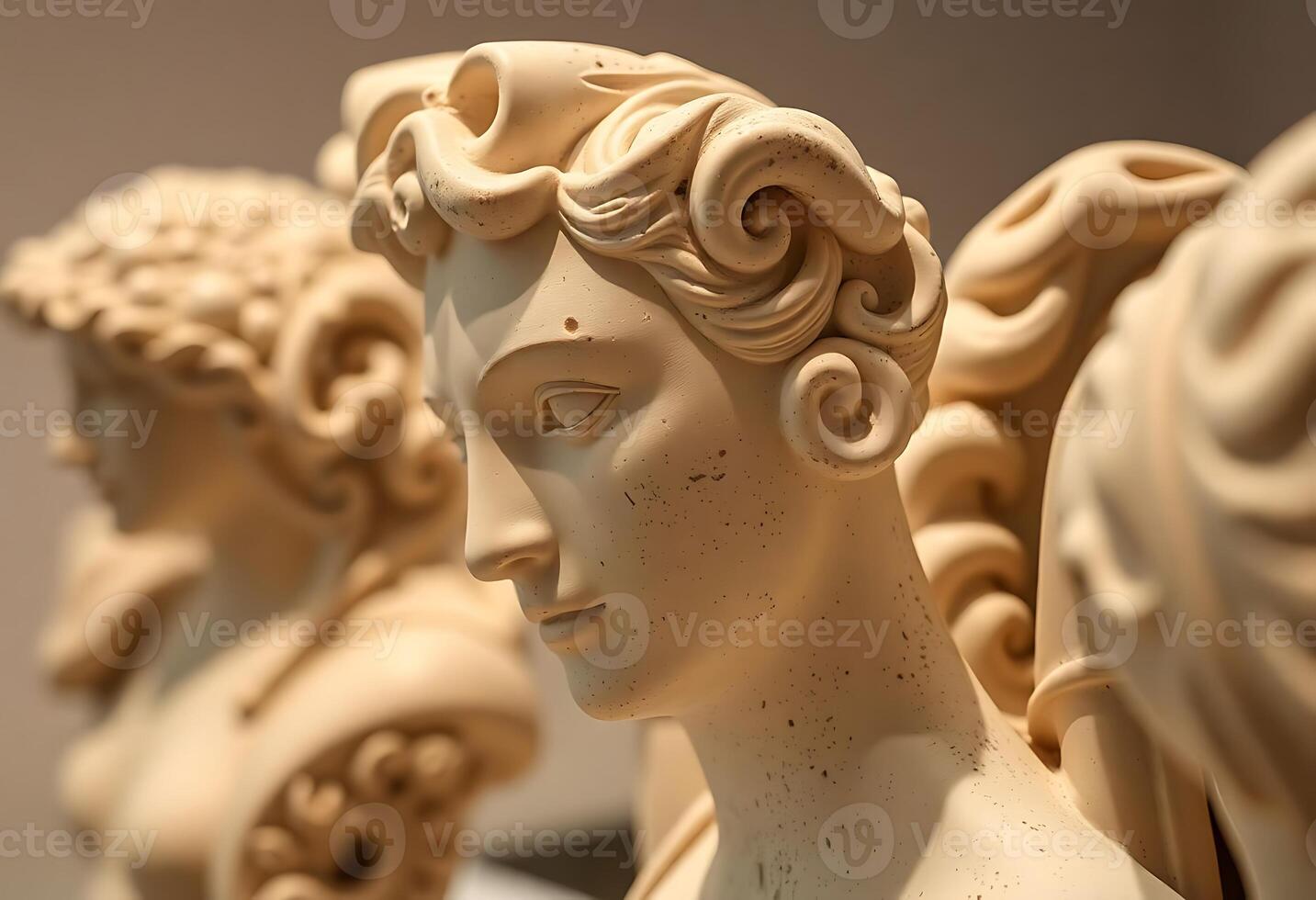 close up of a group of statues of women photo