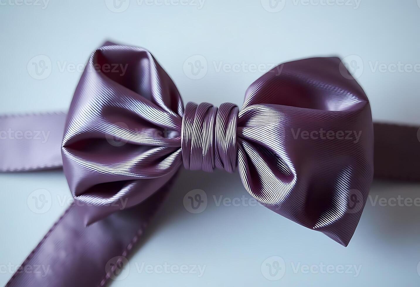 close up of a purple bow tie photo