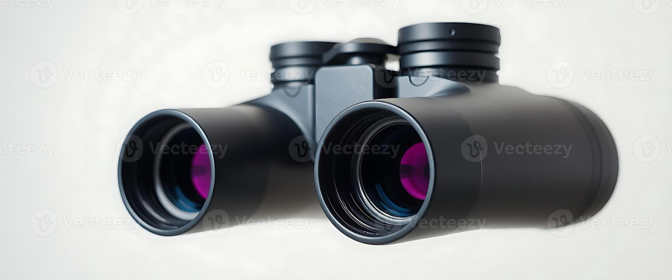 pair of binoculars sitting next to each other photo