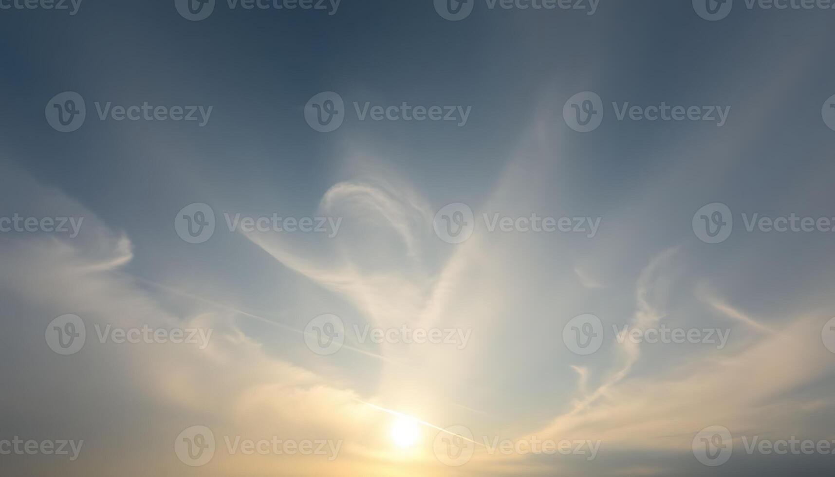A beautiful sunset with clouds in the sky photo