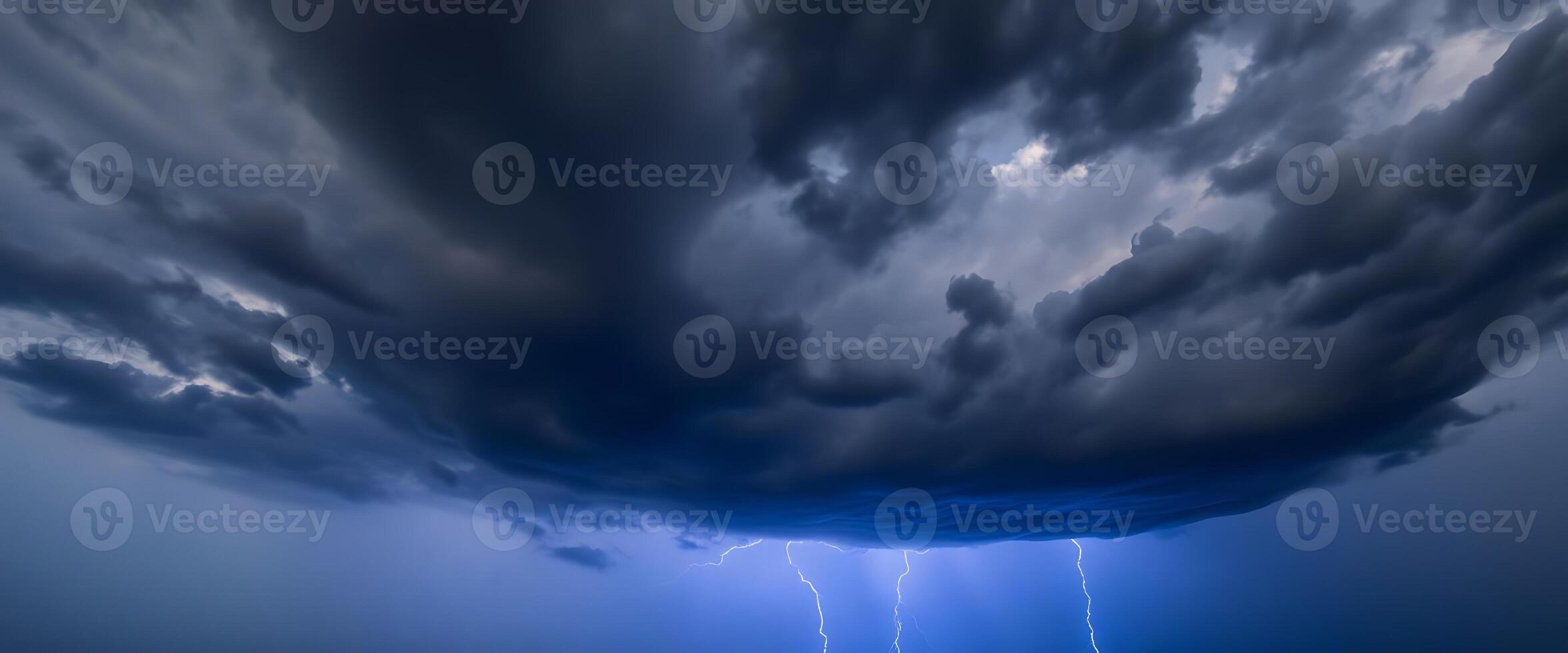 A storm cloud with lightning and clouds photo