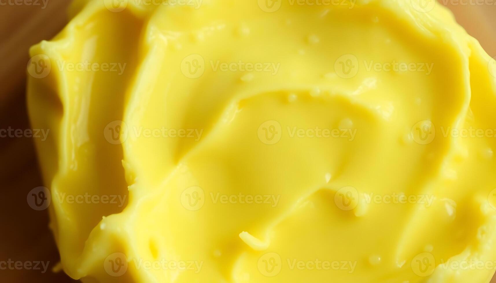 close up of a yellow substance on a wooden surface photo