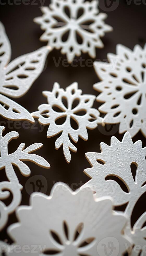 group of snowflakes sitting on top of a table photo