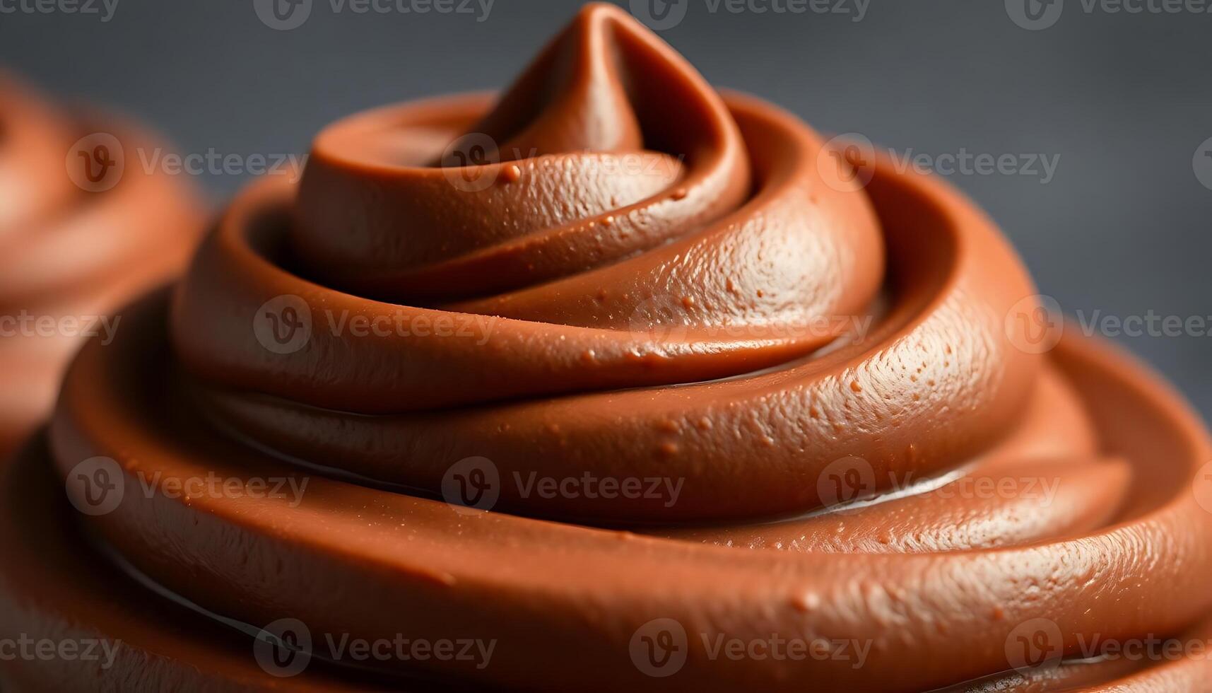 close up of a cupcake with chocolate frosting photo
