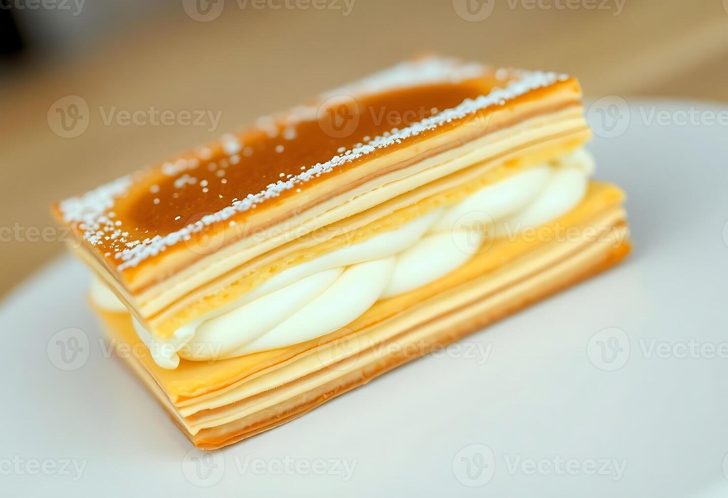 stack of pancakes on a plate covered in powdered sugar photo