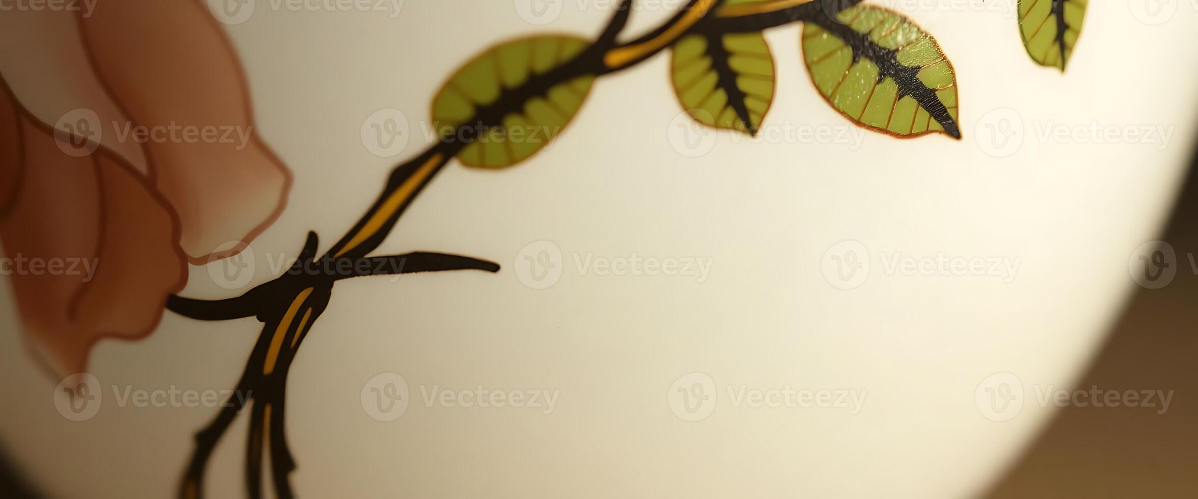 close up of a vase with a rose on it photo