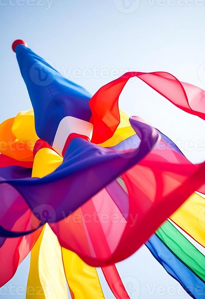 rainbow colored kite flying in the sky photo