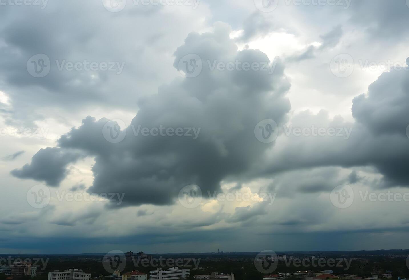 A cloudy sky with a few large clouds photo