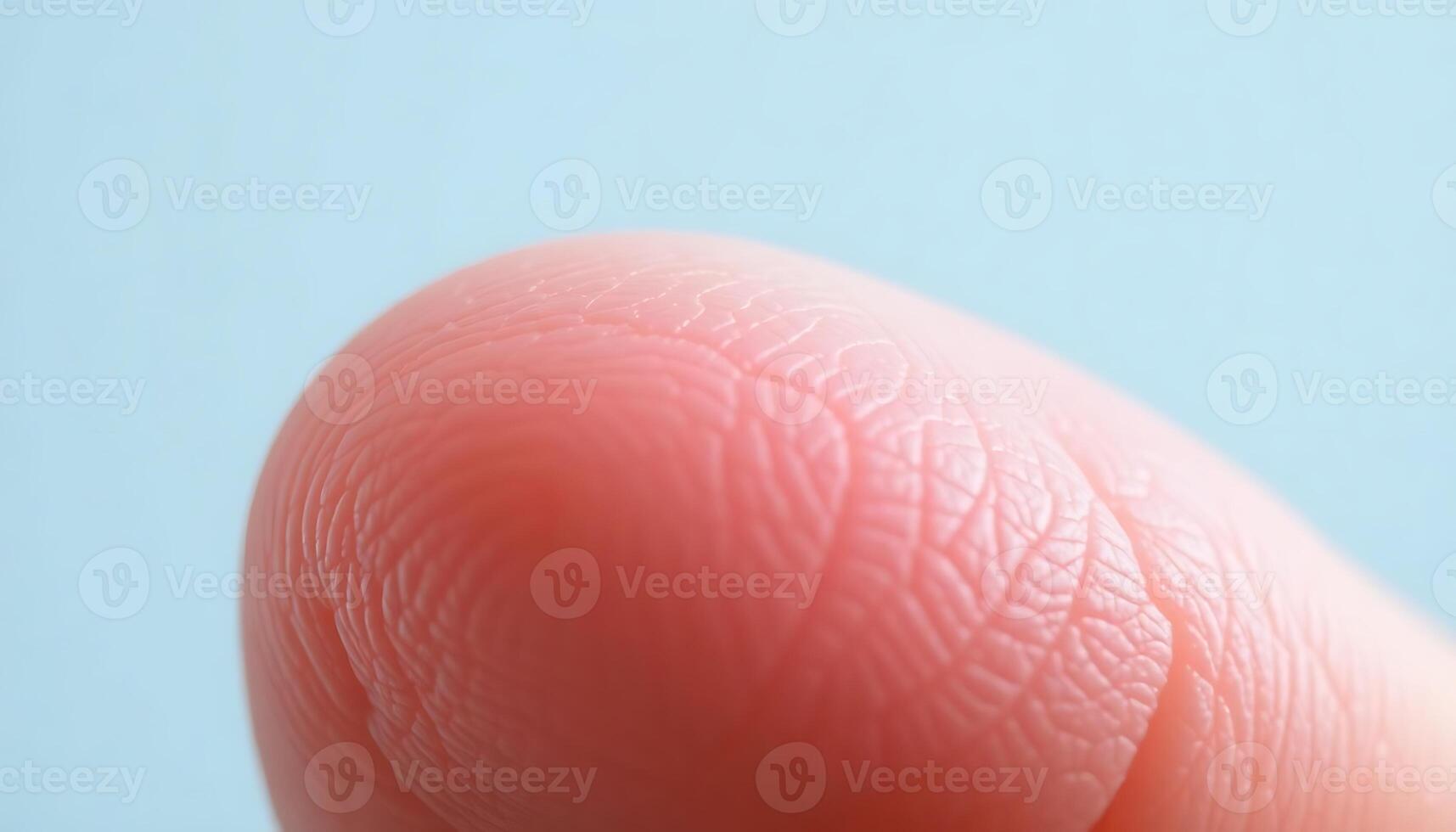 close up of a finger with a blue background photo