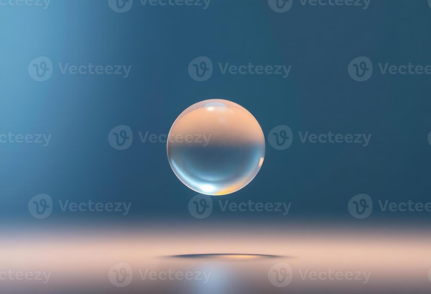 drop of water on a table with a blue background photo