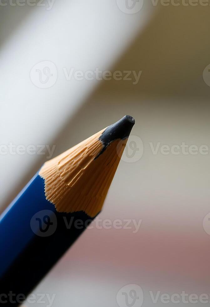 close up of a blue pencil with a black tip photo
