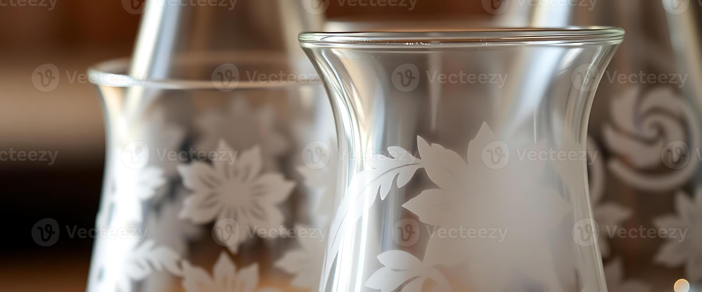 A close up of three vases with floral designs photo