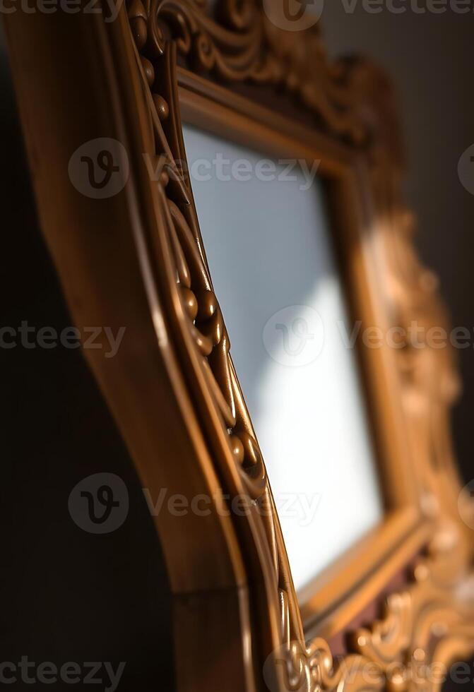 A golden frame with a mirror on it photo