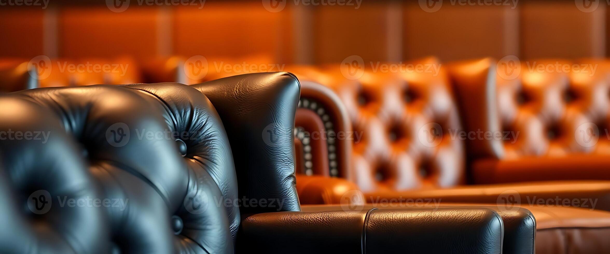 row of brown leather chairs in a room photo