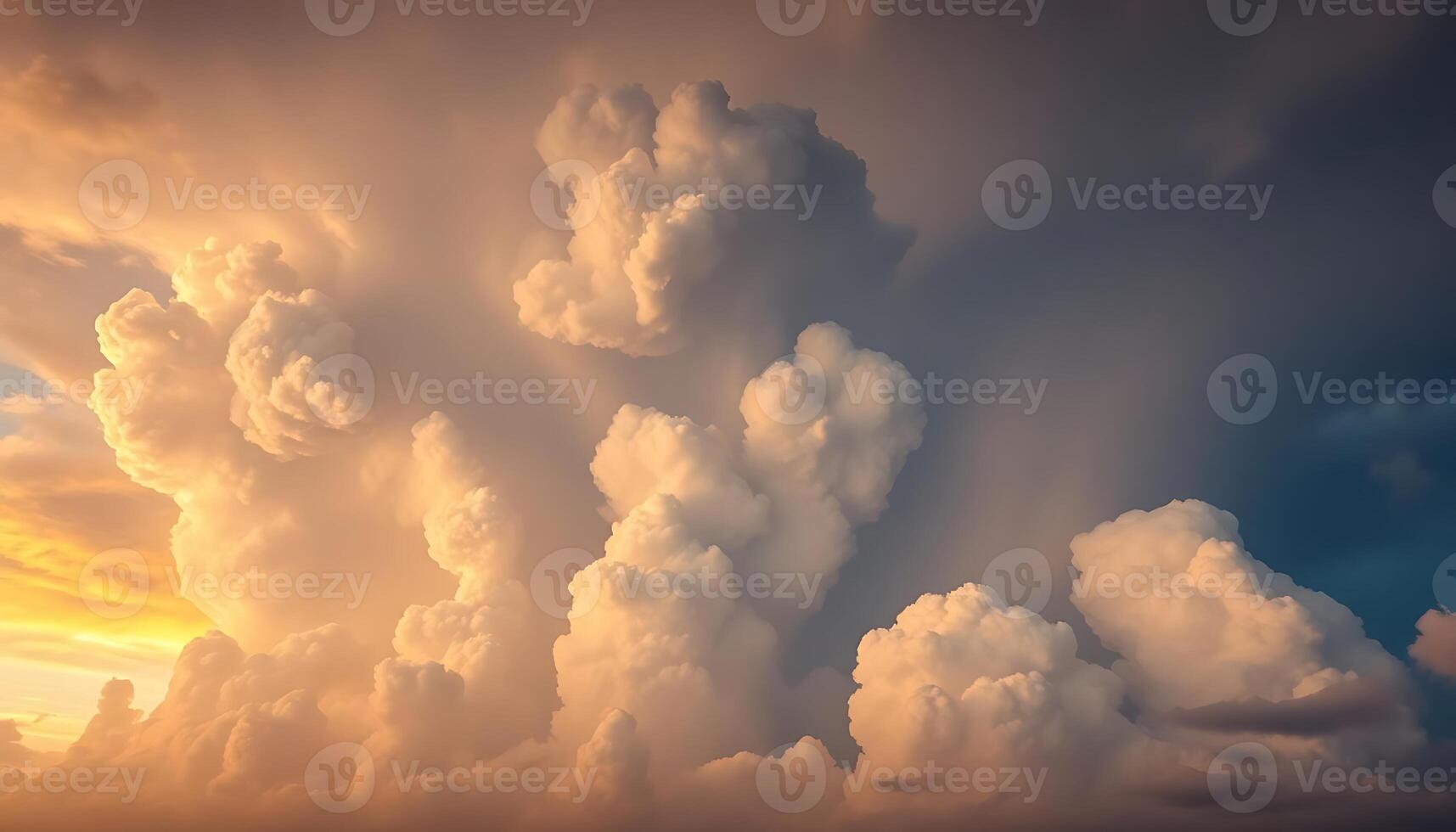 A large cloud is seen in the sky at sunset photo
