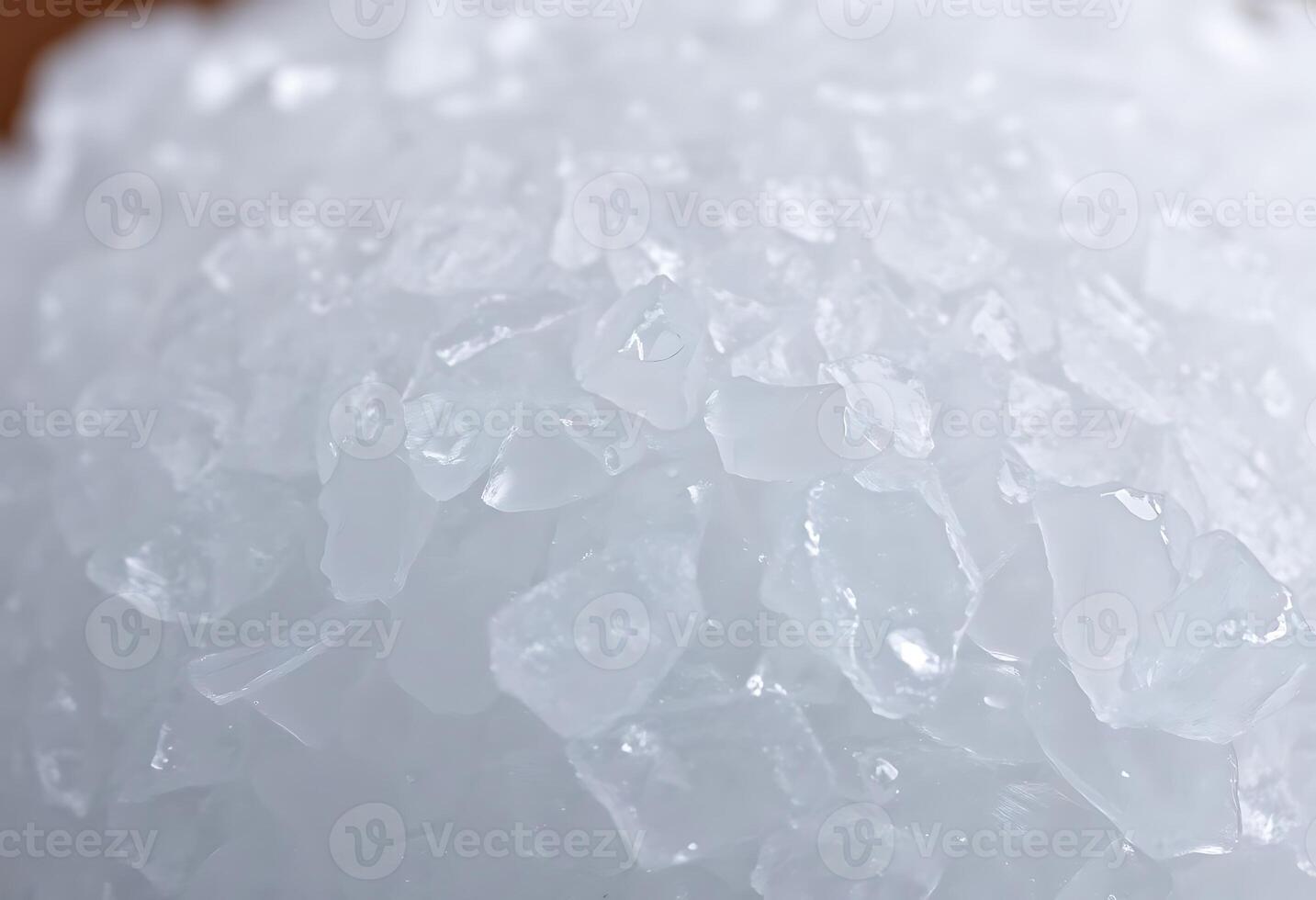 pile of ice sitting on top of a wooden table photo