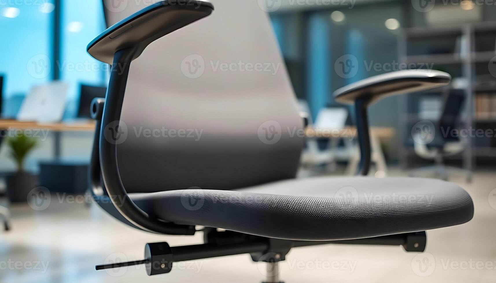 black office chair sitting in an office photo