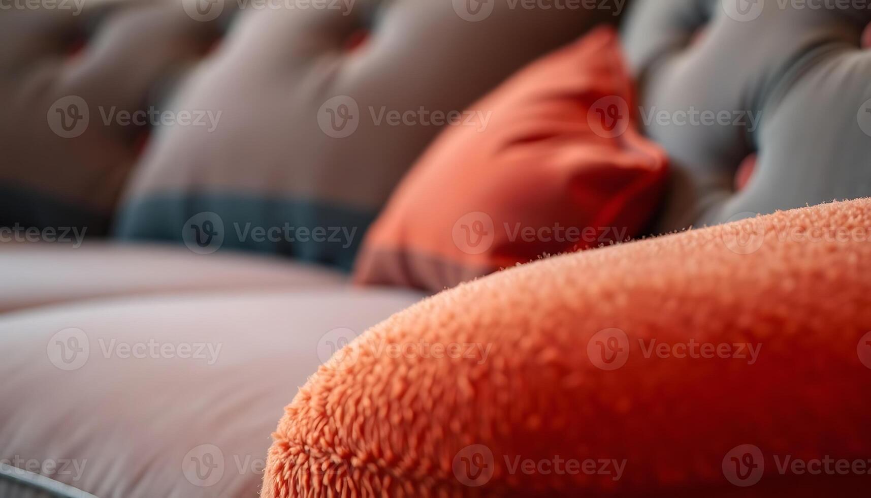 close up of a couch with many pillows photo