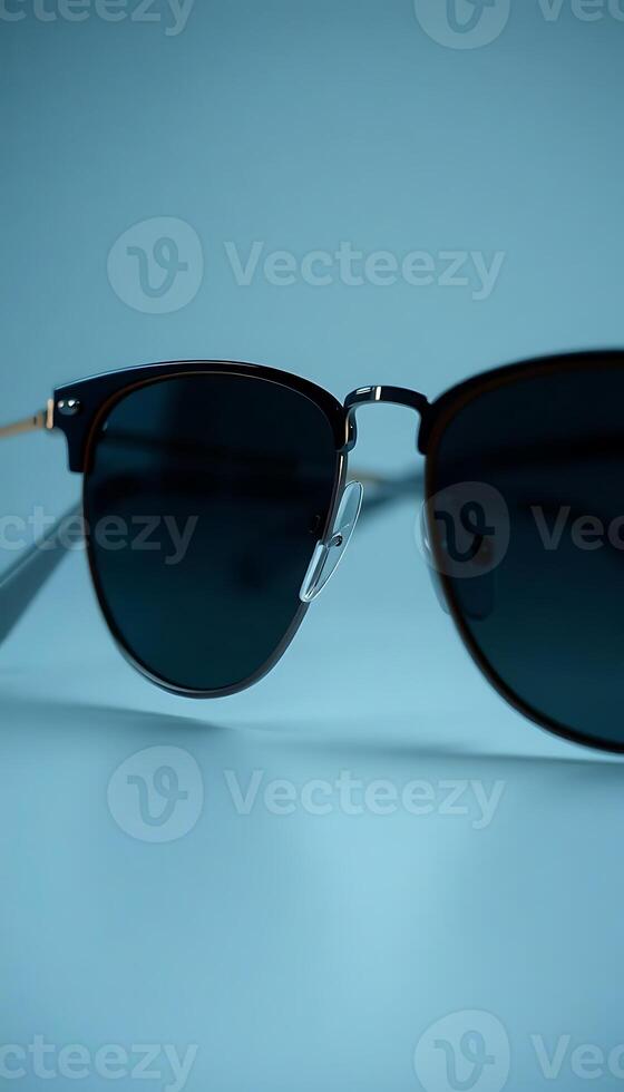 pair of sunglasses on a blue background photo