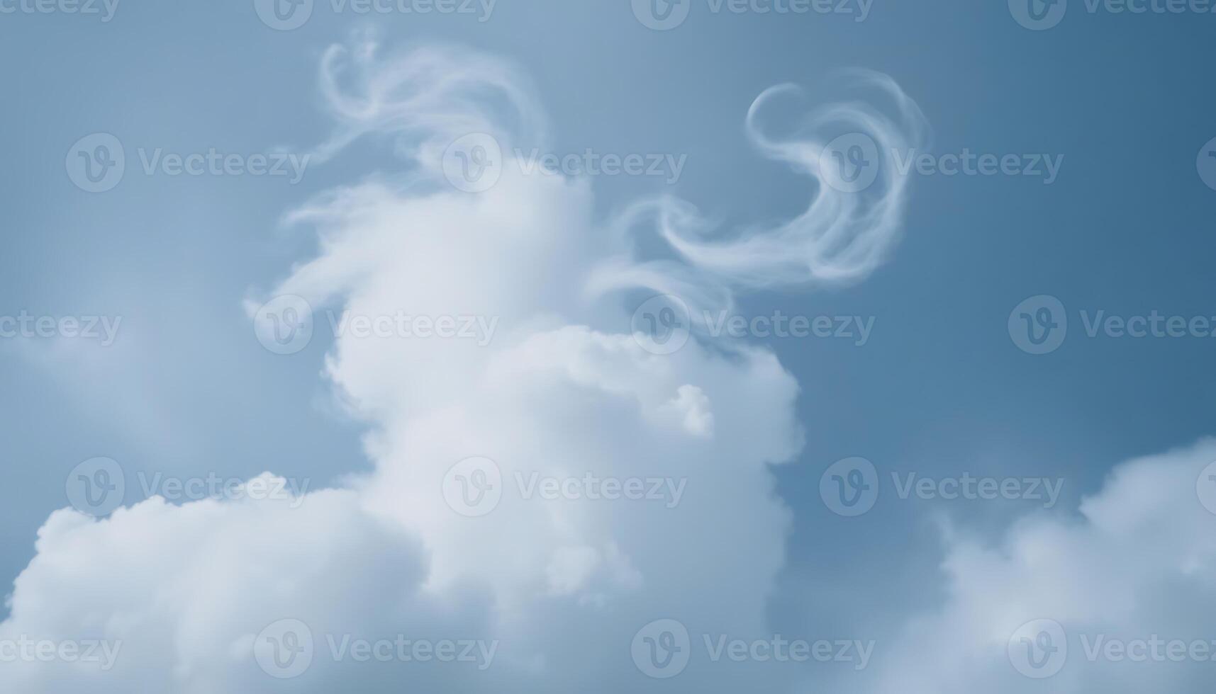 A white cloud with a horn on top of it photo