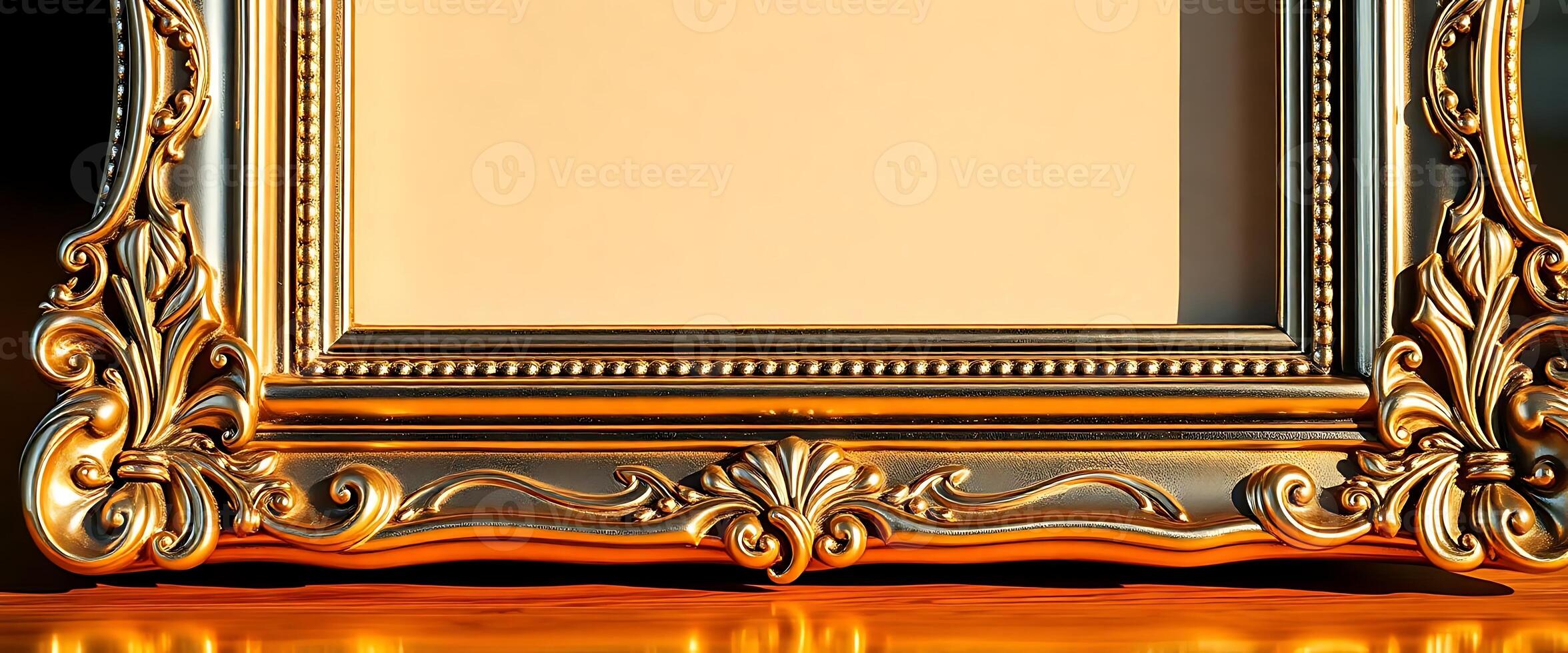 ornate gold frame on a shiny surface photo