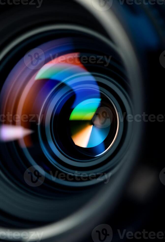 A camera lens with a colorful light photo