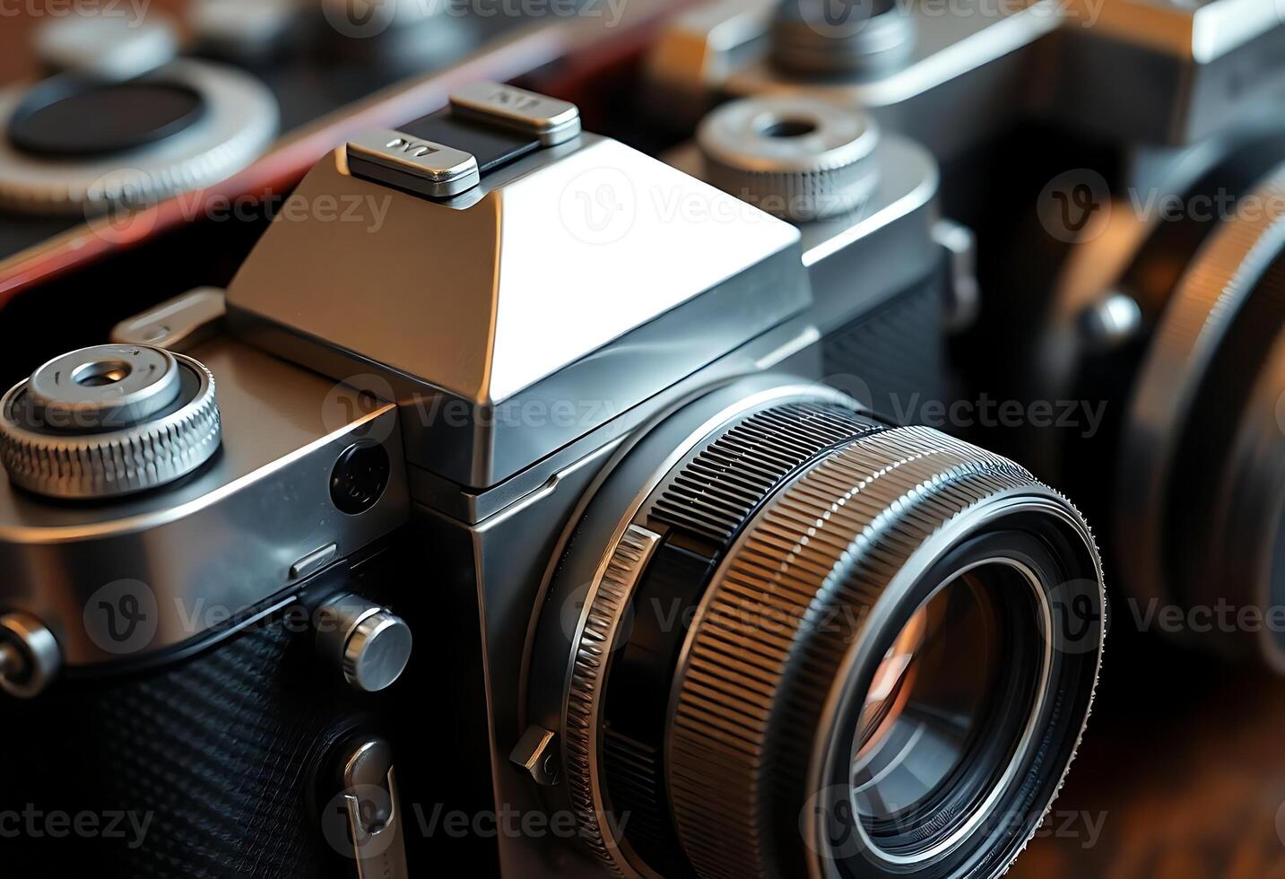 camera sitting on top of a wooden table photo