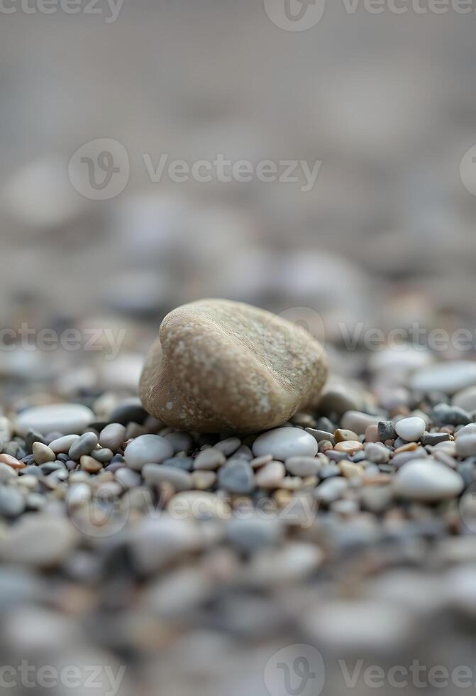 rock sitting on top of a pile of rocks photo