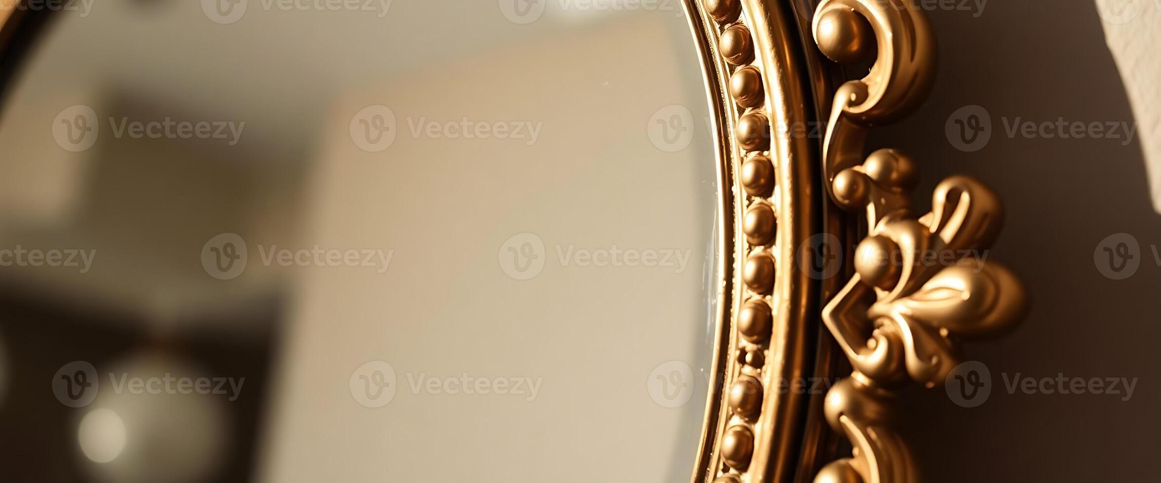 Golden mirror on the wall with a reflection of the room photo