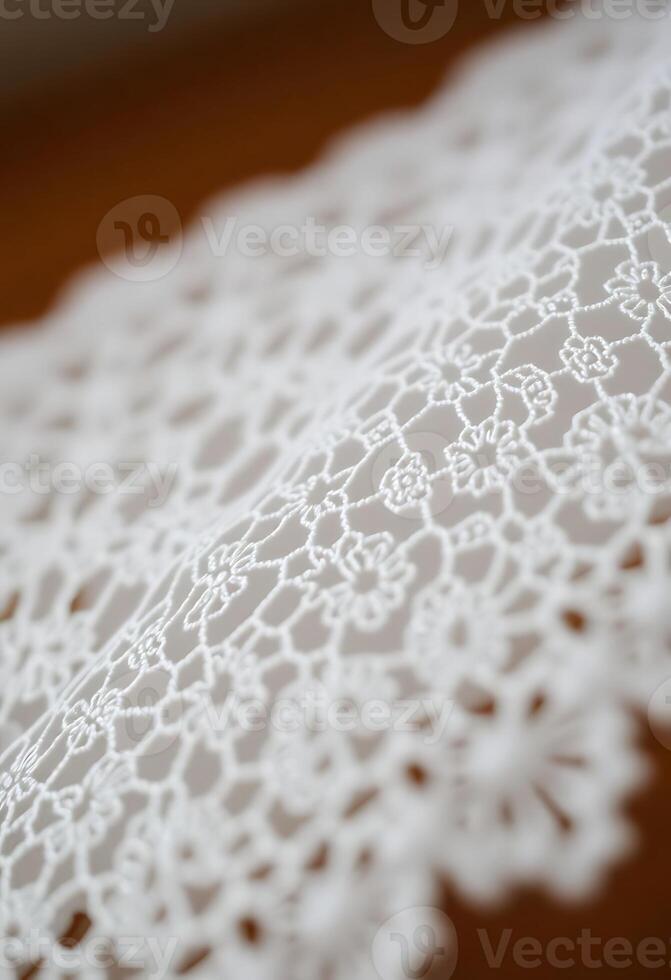 close up of a white lace on a table photo