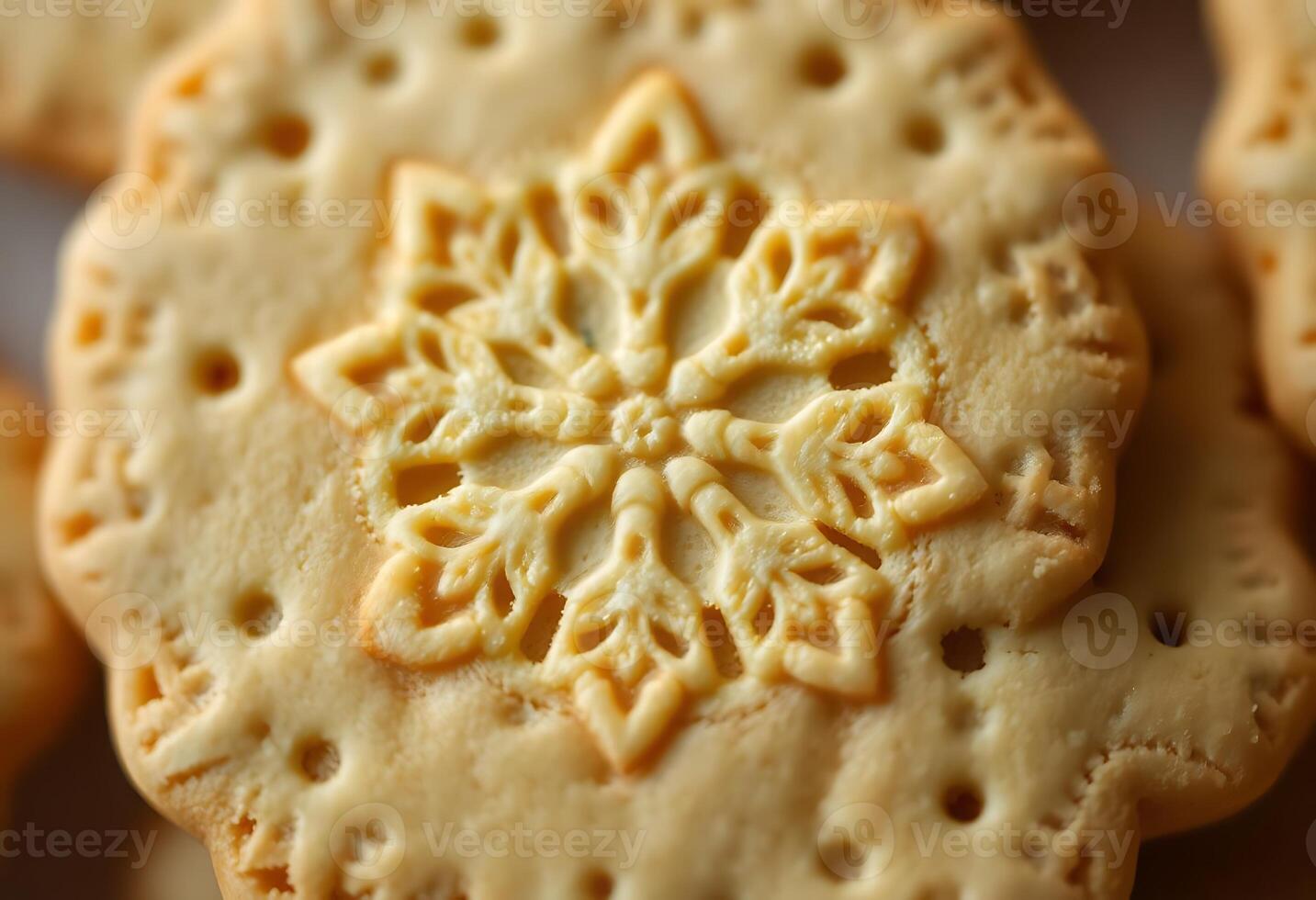 A close up of a cookie with a snowflake design photo