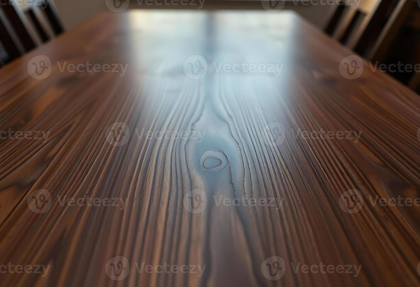 close up of a wooden table with chairs photo
