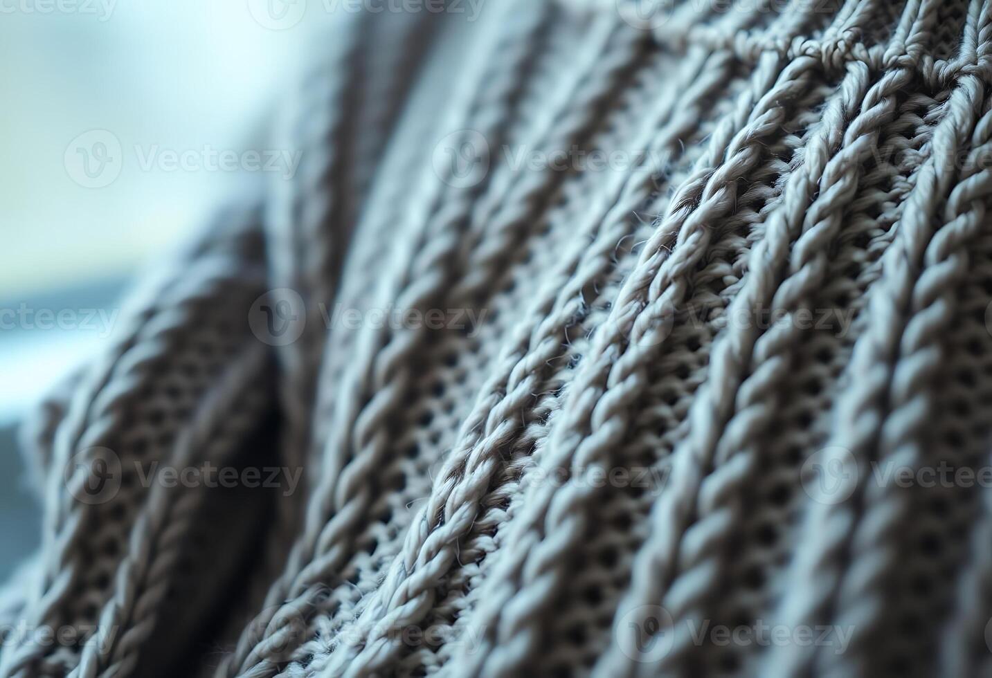 close up of a sweater on a bed photo
