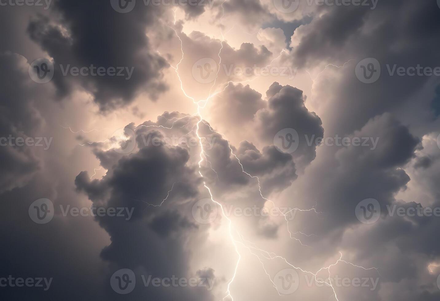 Lightning strikes through the clouds in a stormy sky photo