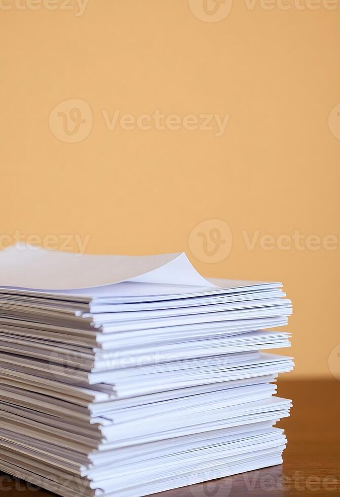 Stack of papers on a wooden table photo