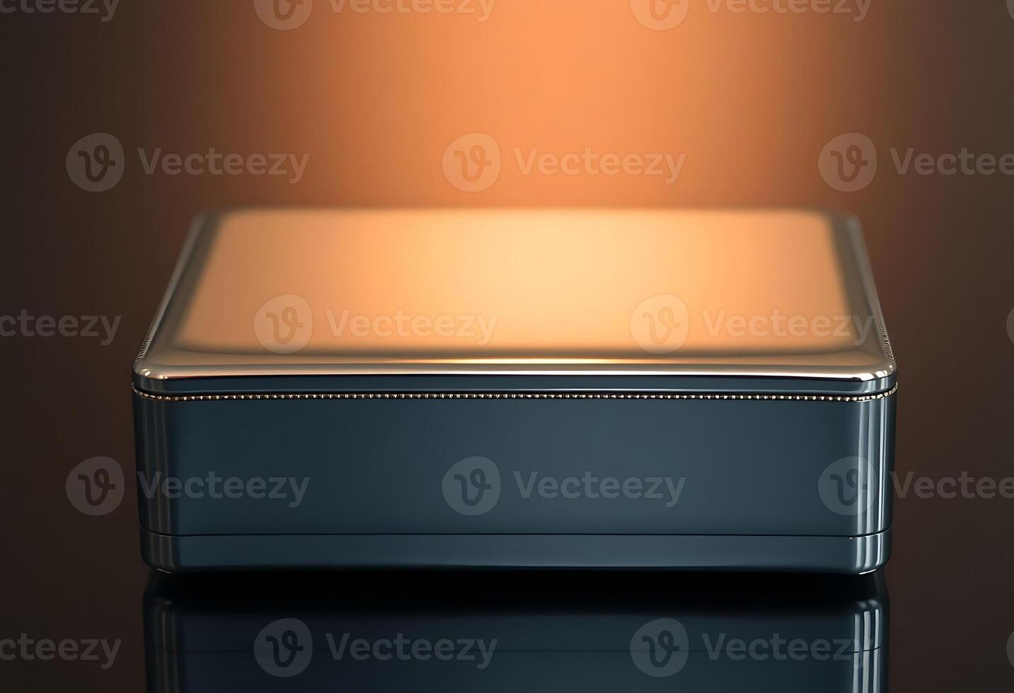 shiny metal box sitting on top of a table photo