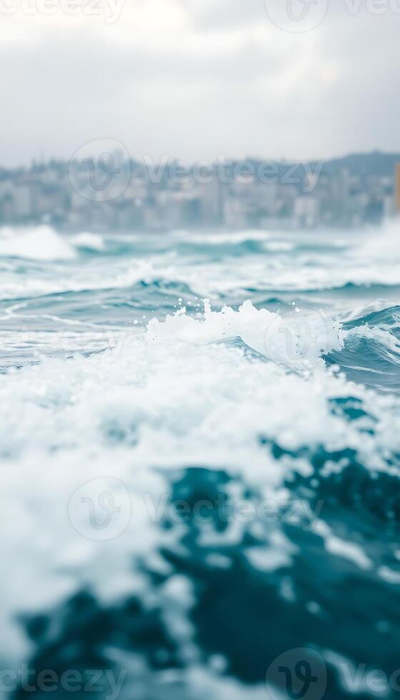 view of a body of water with a city in the background photo