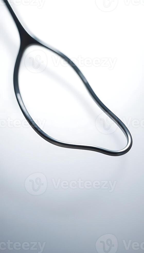 pair of black scissors on a white background photo