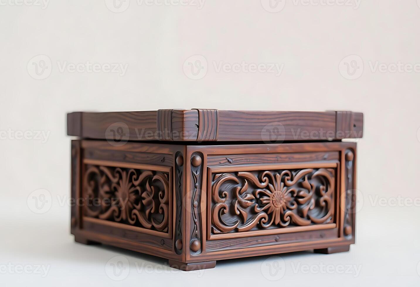 A wooden box with intricate carvings on it photo