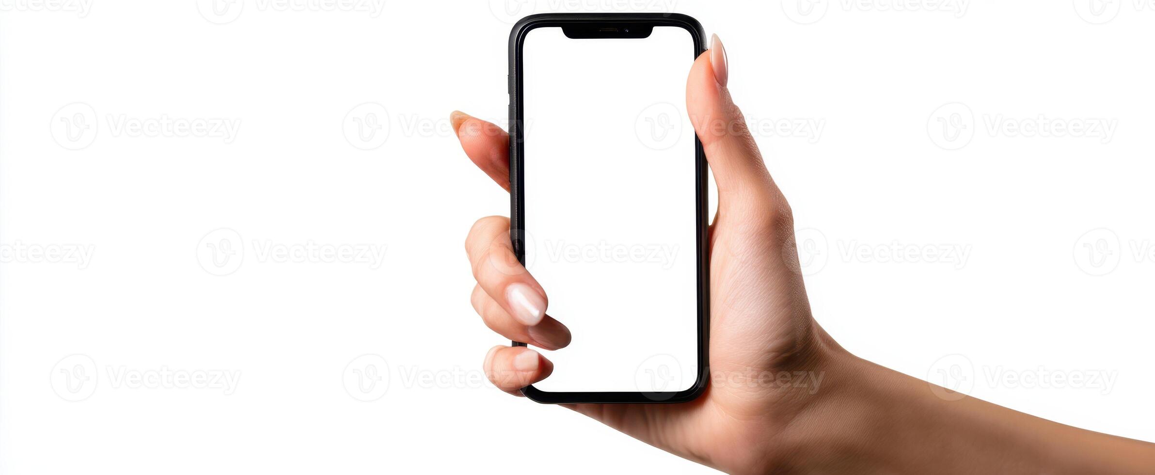 The hand holding a smartphone with a blank screen against a white background. photo