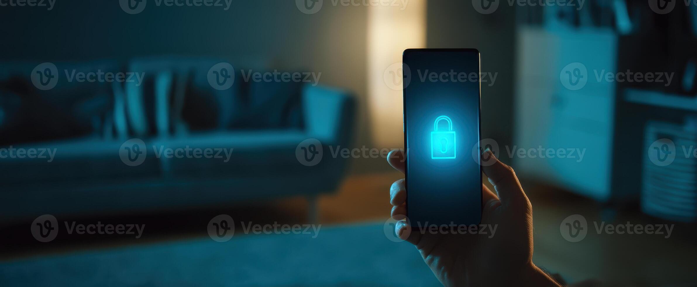 The smartphone displaying a security lock in a dimly lit living room. photo